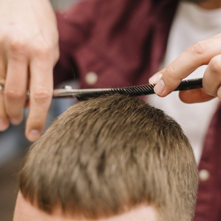close-up-view-man-getting-haircut